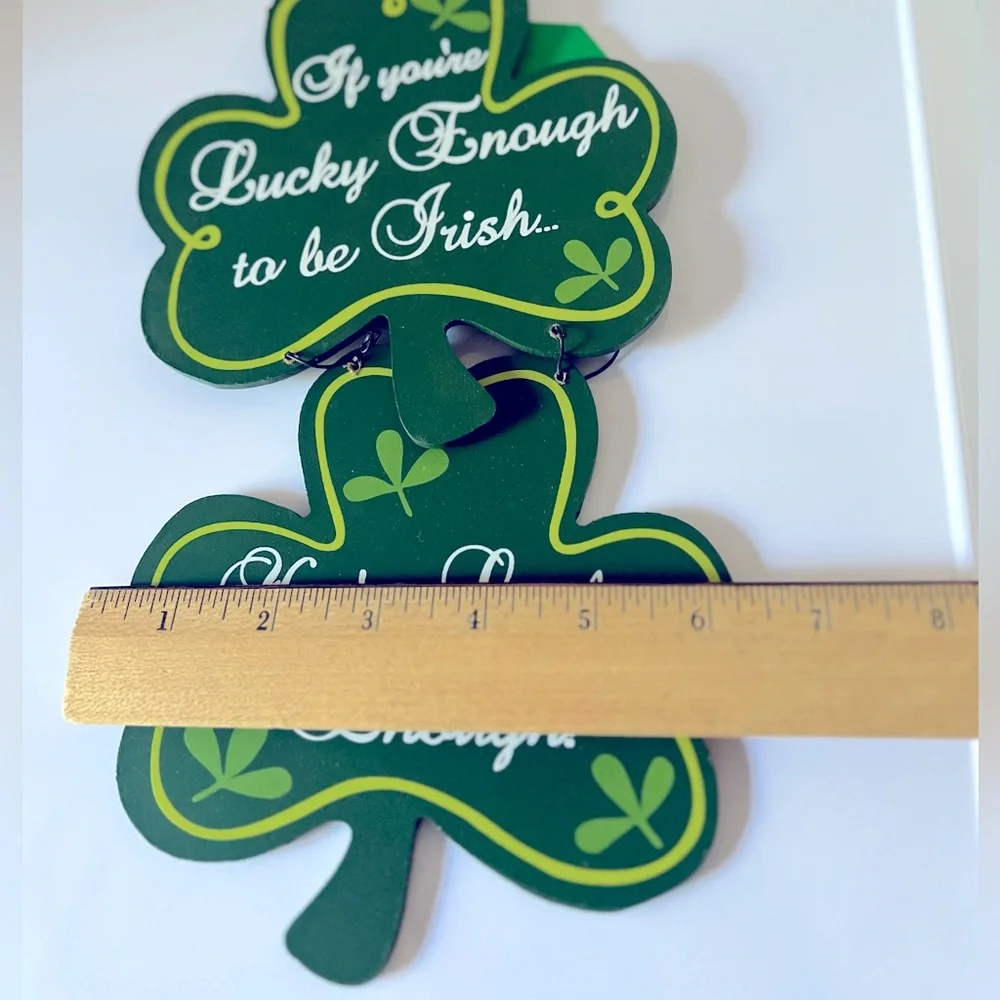 Two Kelly Green Irish Decorations Featuring Shamrocks and Witty Verbiage.
